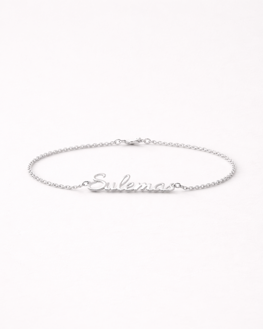 Silver bracelet with 'Sulamis' engraving on a white background