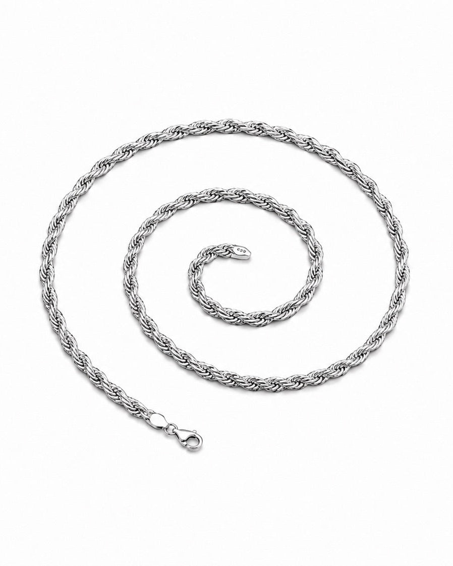 Silver chain necklace on a white background