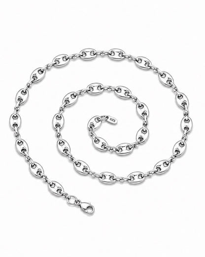 Silver chain necklace on a white background