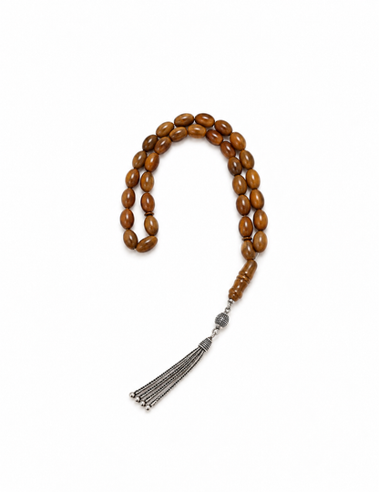 Natural amber misbaha in burnt siena, prayer beads from Silver Corner