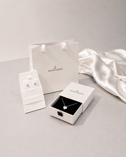 Silver Corner gift packaging with white gift bag, earring box and necklace box